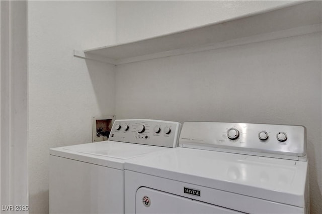 201 Mission Laguna Ln Unit 104, Las Vegas, NV 89107 - laundry room with washing machine and dryer