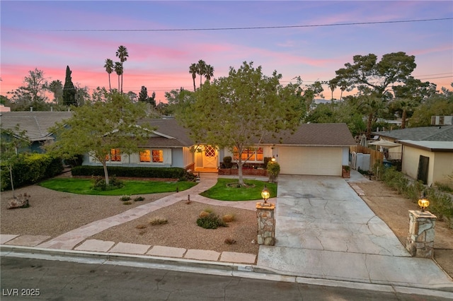 2400 Llewellyn Dr, Las Vegas, NV 89102 - view of front of property featuring a garage and concrete driveway