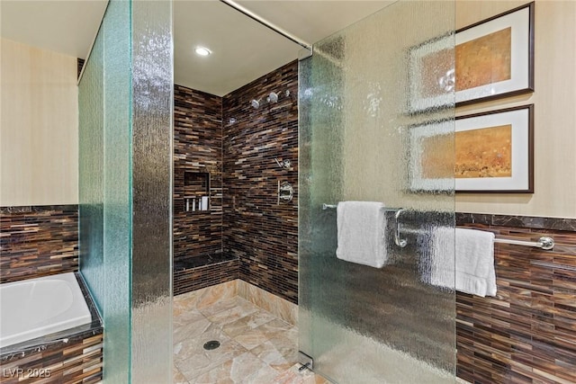 2000 Fashion Show Dr Unit 6109, Las Vegas, NV 89109 - bathroom featuring a stall shower and a bath