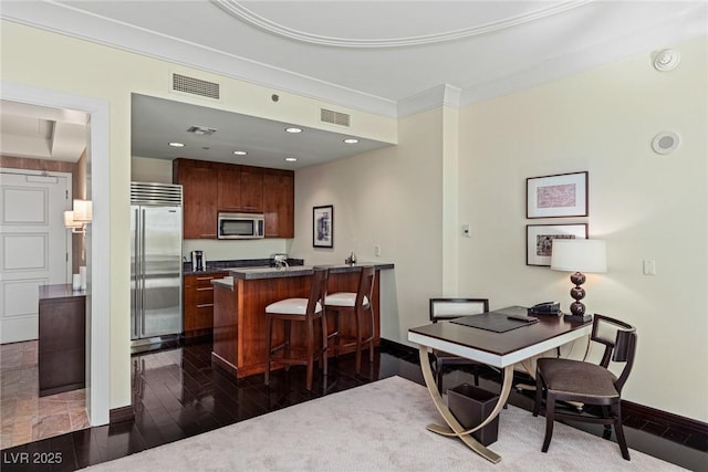 2000 Fashion Show Dr Unit 6109, Las Vegas, NV 89109 - dining area featuring dark wood-type flooring, recessed lighting, crown molding, and an office area