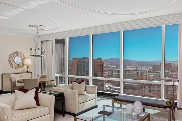 2000 Fashion Show Dr Unit 6109, Las Vegas, NV 89109 - living room with a mountain view, floor to ceiling windows, carpet flooring, and a city view