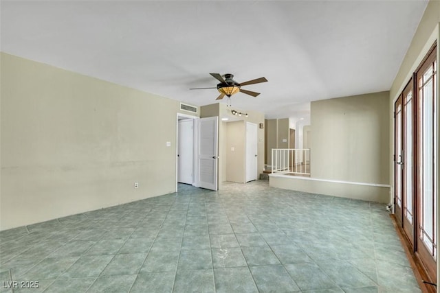 3746 E Harmon Ave, Las Vegas, NV 89121 - empty room featuring ceiling fan and tile patterned floors