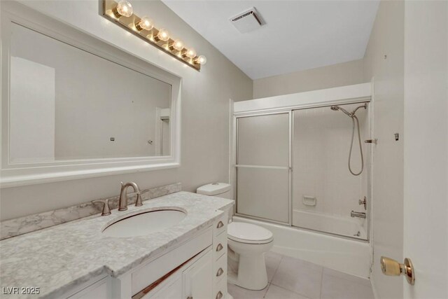 3746 E Harmon Ave, Las Vegas, NV 89121 - full bathroom with vanity, tile patterned flooring, and shower / bath combination with glass door