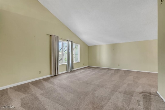 3746 E Harmon Ave, Las Vegas, NV 89121 - spare room with lofted ceiling and carpet flooring