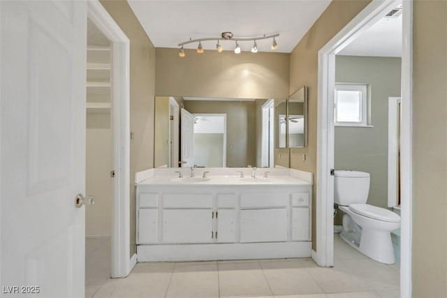 3746 E Harmon Ave, Las Vegas, NV 89121 - full bathroom with double vanity and tile patterned floors