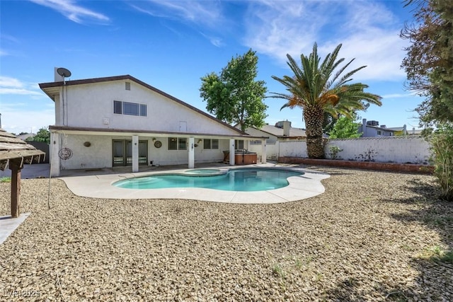 3746 E Harmon Ave, Las Vegas, NV 89121 - view of pool with a fenced backyard, a patio, and a pool with connected hot tub