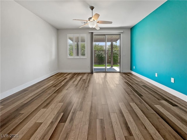 6312 Conlon St, North Las Vegas, NV 89081 - empty room featuring wood finished floors and ceiling fan