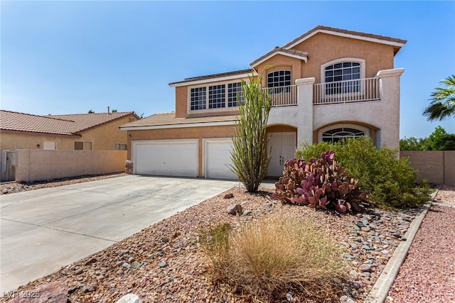 1798 Lakewood Dr, Henderson, NV 89012 - mediterranean / spanish home with stucco siding, driveway, a garage, and a balcony