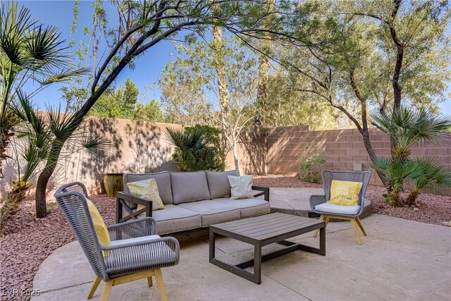 3420 Lockport St, Las Vegas, NV 89129 - fenced backyard featuring outdoor lounge area and a patio area