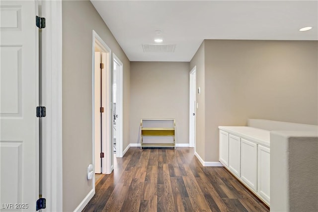 3420 Lockport St, Las Vegas, NV 89129 - hallway featuring dark wood-style flooring and recessed lighting