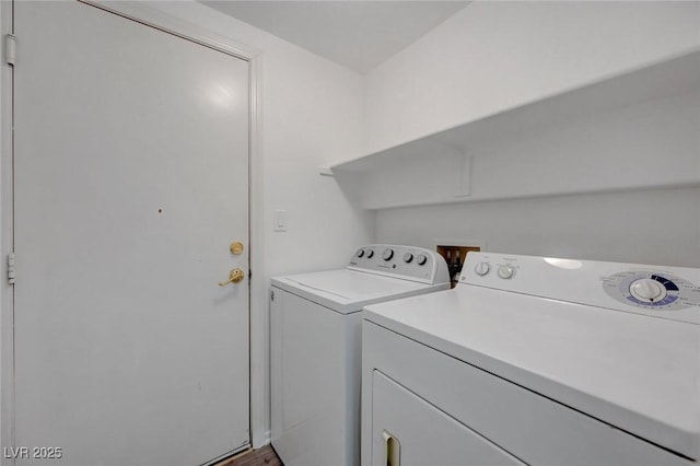 4751 Lone Grove Dr, Las Vegas, NV 89139 - laundry room featuring washing machine and clothes dryer and wood finished floors