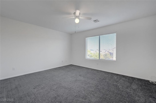 4751 Lone Grove Dr, Las Vegas, NV 89139 - empty room featuring dark colored carpet and a ceiling fan