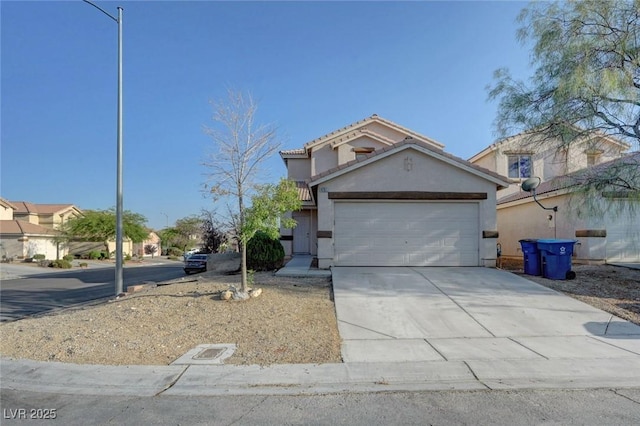 4751 Lone Grove Dr, Las Vegas, NV 89139 - view of front facade featuring stucco siding, an attached garage, concrete driveway, and a tiled roof