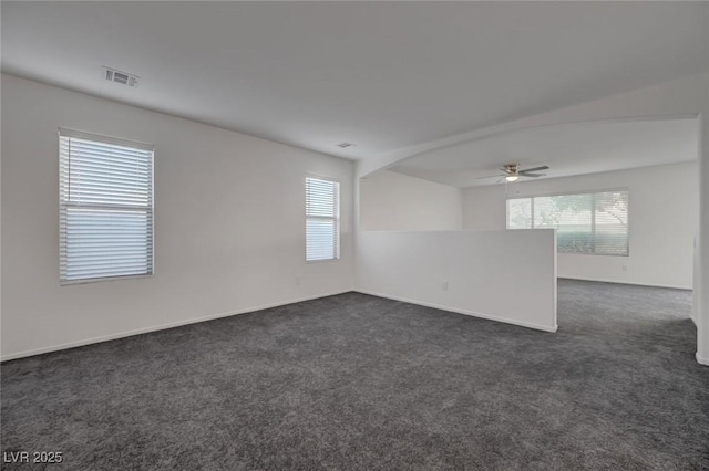 4751 Lone Grove Dr, Las Vegas, NV 89139 - unfurnished room featuring plenty of natural light, dark colored carpet, and a ceiling fan