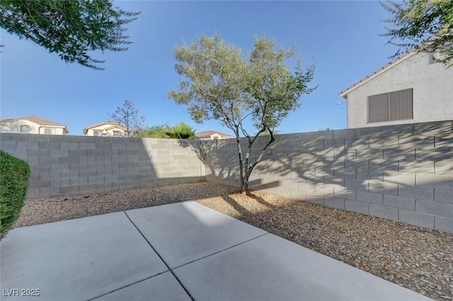 4751 Lone Grove Dr, Las Vegas, NV 89139 - fenced backyard featuring a patio