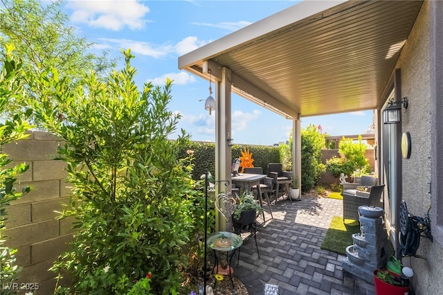 3782 Neblina Dr, Henderson, NV 89052 - fenced backyard featuring a patio and outdoor dining area