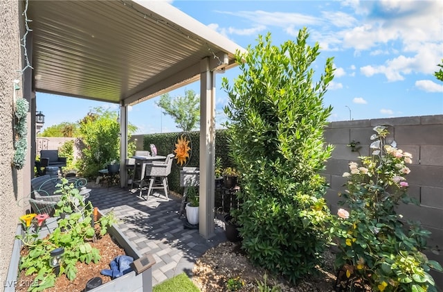 3782 Neblina Dr, Henderson, NV 89052 - fenced backyard with outdoor dining space and a patio area