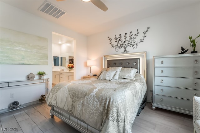 3782 Neblina Dr, Henderson, NV 89052 - bedroom featuring ensuite bathroom, wood finished floors, and ceiling fan
