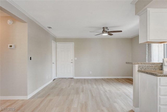 7300 Pirates Cove Rd Unit 1032, Las Vegas, NV 89145 - unfurnished living room featuring ceiling fan, light wood-style flooring, and ornamental molding