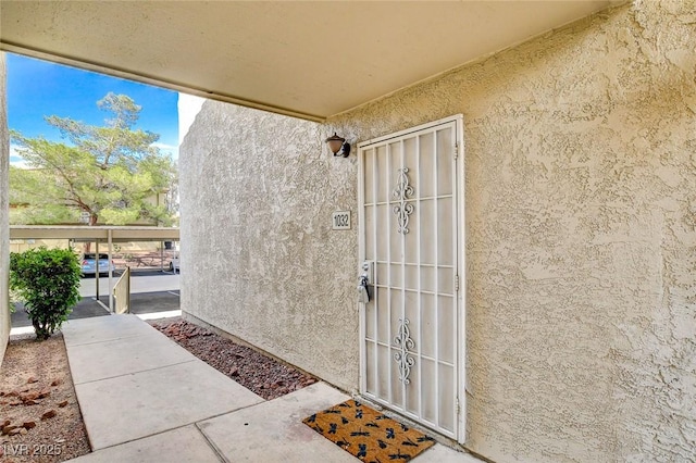 7300 Pirates Cove Rd Unit 1032, Las Vegas, NV 89145 - view of exterior entry featuring stucco siding