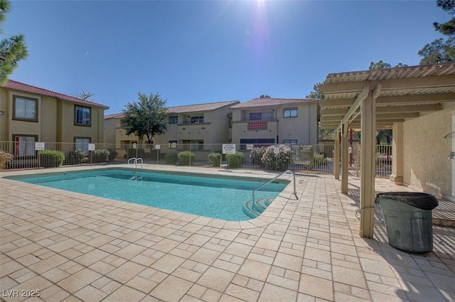7300 Pirates Cove Rd Unit 1032, Las Vegas, NV 89145 - community pool with a patio and a residential view