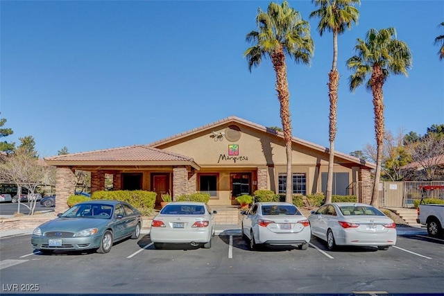 7300 Pirates Cove Rd Unit 1032, Las Vegas, NV 89145 - view of building exterior featuring uncovered parking