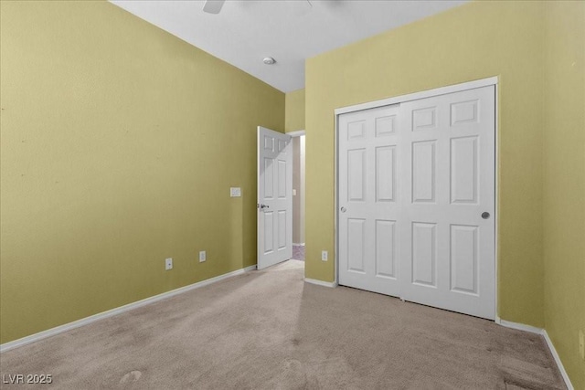 9233 Onyx Point Ct, Henderson, NV 89074 - unfurnished bedroom featuring carpet floors, a closet, and ceiling fan