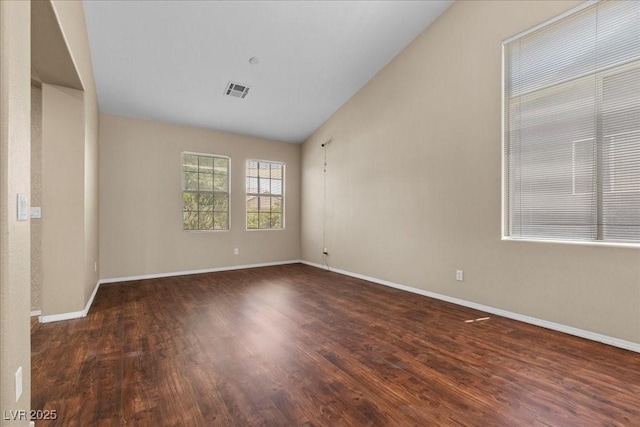 9233 Onyx Point Ct, Henderson, NV 89074 - spare room with wood finished floors and vaulted ceiling