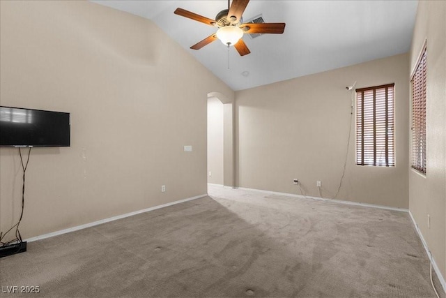 9233 Onyx Point Ct, Henderson, NV 89074 - unfurnished living room with lofted ceiling, ceiling fan, carpet, and arched walkways