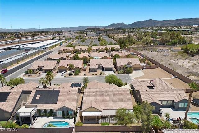 9233 Onyx Point Ct, Henderson, NV 89074 - aerial view of residential area featuring a mountain backdrop and a pool area