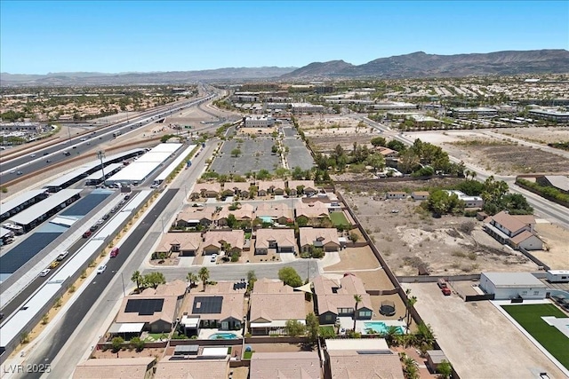 9233 Onyx Point Ct, Henderson, NV 89074 - aerial view of property and surrounding area with a mountainous background and nearby suburban area
