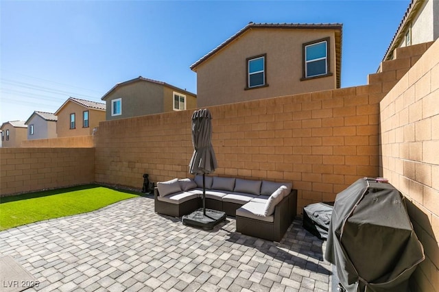 10939 Cheshire Woods Ave, Las Vegas, NV 89166 - fenced backyard featuring an outdoor hangout area and a patio