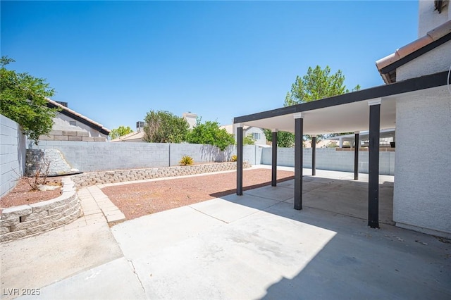 6524 Rain Forest Dr, Las Vegas, NV 89108 - fenced backyard with a patio