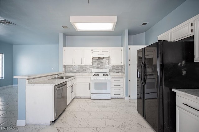 6524 Rain Forest Dr, Las Vegas, NV 89108 - kitchen with white gas range oven, dishwasher, black fridge with ice dispenser, under cabinet range hood, and a peninsula