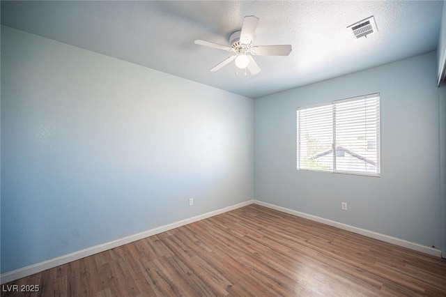 6524 Rain Forest Dr, Las Vegas, NV 89108 - empty room featuring wood finished floors and ceiling fan