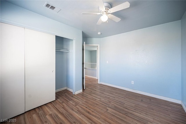 6524 Rain Forest Dr, Las Vegas, NV 89108 - unfurnished bedroom with wood finished floors, a closet, and ceiling fan