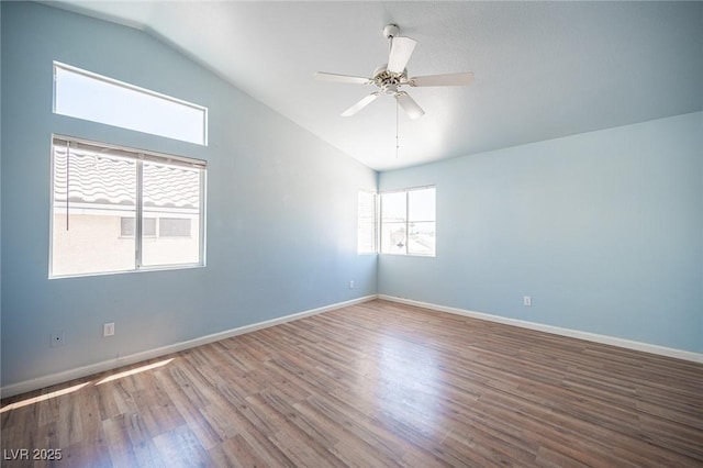 6524 Rain Forest Dr, Las Vegas, NV 89108 - empty room featuring lofted ceiling, wood finished floors, and a ceiling fan