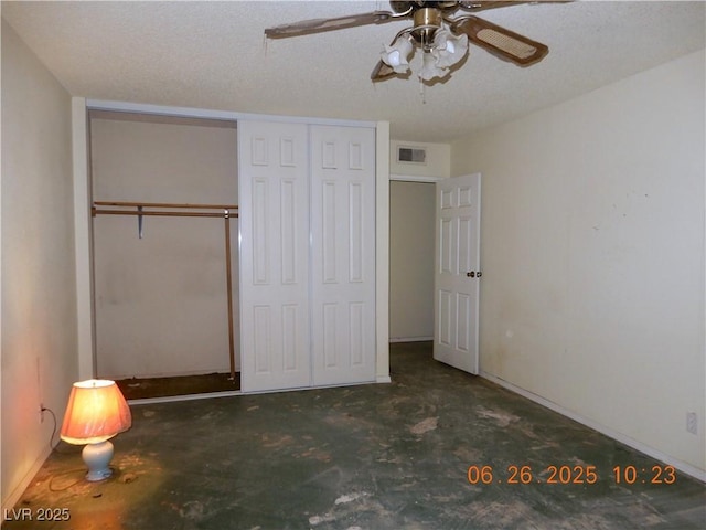 3175 Palmdale St, Las Vegas, NV 89121 - unfurnished bedroom featuring a closet, a textured ceiling, and ceiling fan