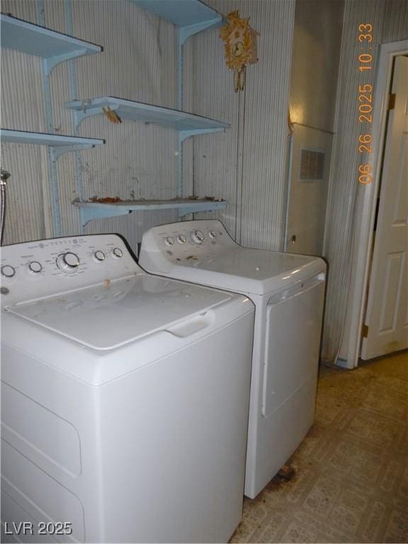 3175 Palmdale St, Las Vegas, NV 89121 - washroom with washer and dryer and light floors