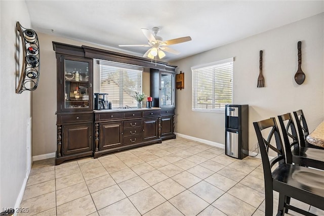 3930 Maranatha Cir, Las Vegas, NV 89103 - dining space with ceiling fan and light tile patterned floors