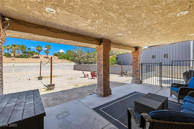 3930 Maranatha Cir, Las Vegas, NV 89103 - fenced backyard with a patio