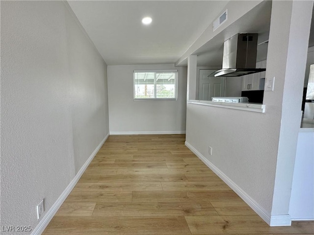 604 N Minnesota St, Las Vegas, NV 89107 - unfurnished room featuring light wood-type flooring and a textured wall