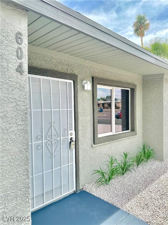 604 N Minnesota St, Las Vegas, NV 89107 - property entrance with stucco siding