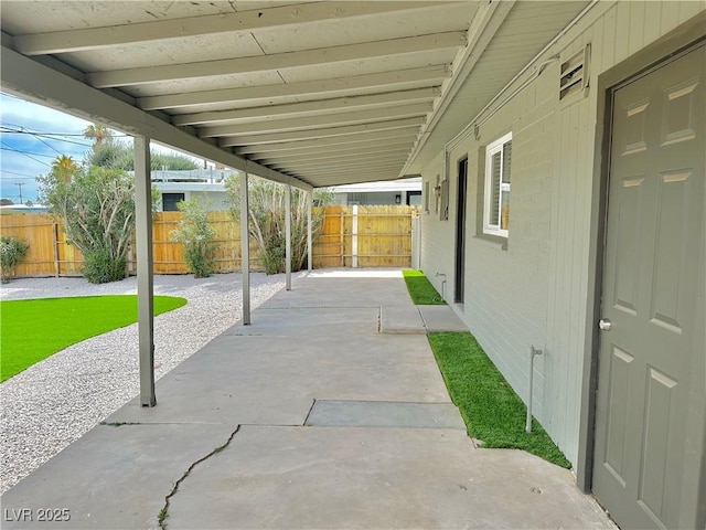 604 N Minnesota St, Las Vegas, NV 89107 - fenced backyard with a patio area