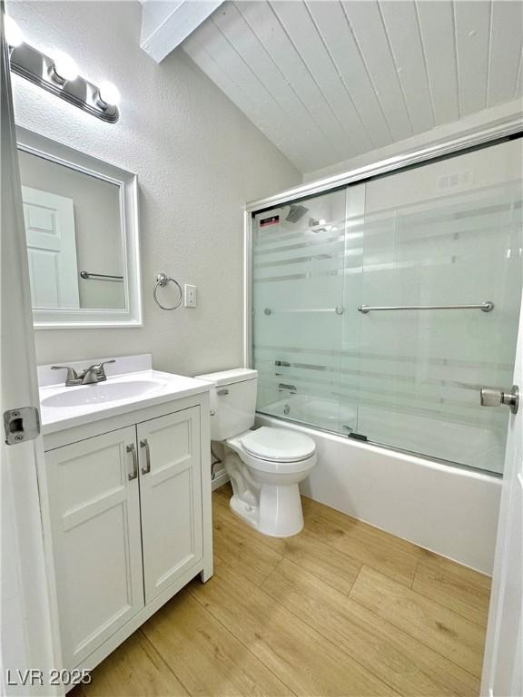 604 N Minnesota St, Las Vegas, NV 89107 - full bathroom with vanity, shower / bath combination with glass door, wood finished floors, lofted ceiling, and wood ceiling