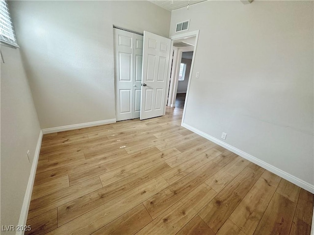 604 N Minnesota St, Las Vegas, NV 89107 - unfurnished bedroom featuring light wood-type flooring and a closet