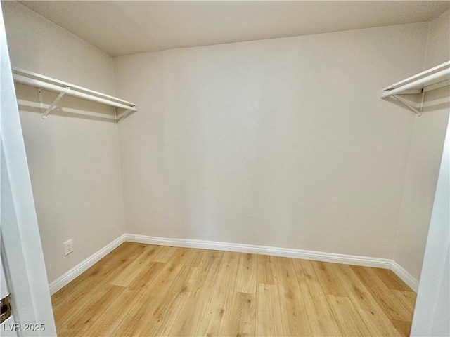 604 N Minnesota St, Las Vegas, NV 89107 - walk in closet with light wood finished floors