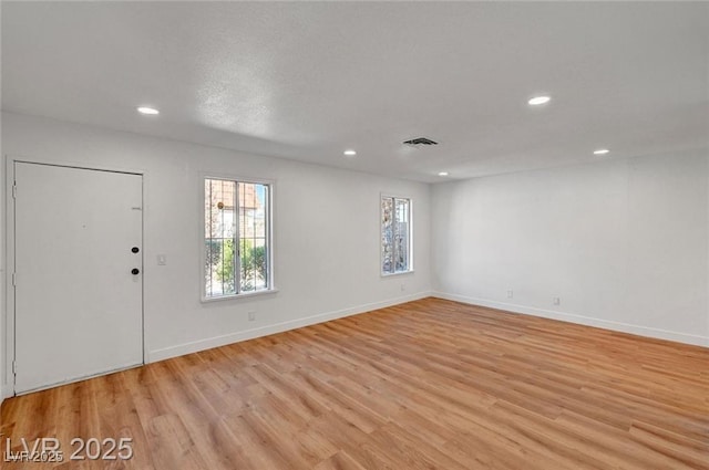 3907 Torsby Pl, Las Vegas, NV 89119 - foyer featuring plenty of natural light, recessed lighting, and light wood-type flooring