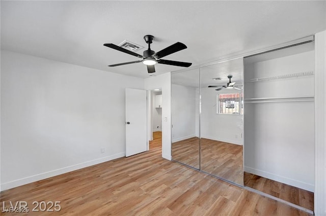 3907 Torsby Pl, Las Vegas, NV 89119 - unfurnished bedroom featuring light wood-style floors, a closet, and ceiling fan