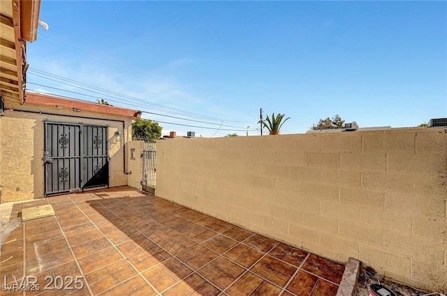 3907 Torsby Pl, Las Vegas, NV 89119 - view of patio / terrace featuring a gate